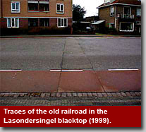 former railroad track still visible in Lasondersingel blacktop, 1999